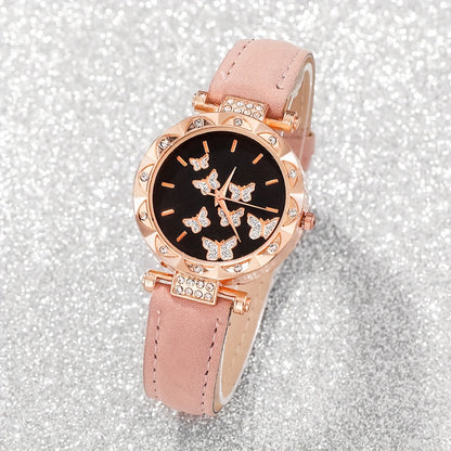 6-piece women's fashion watch set with a sweet pink butterfly quartz timepiece, round case, PU leather strap, zinc alloy case, non-rechargeable battery. Includes bracelet, earrings