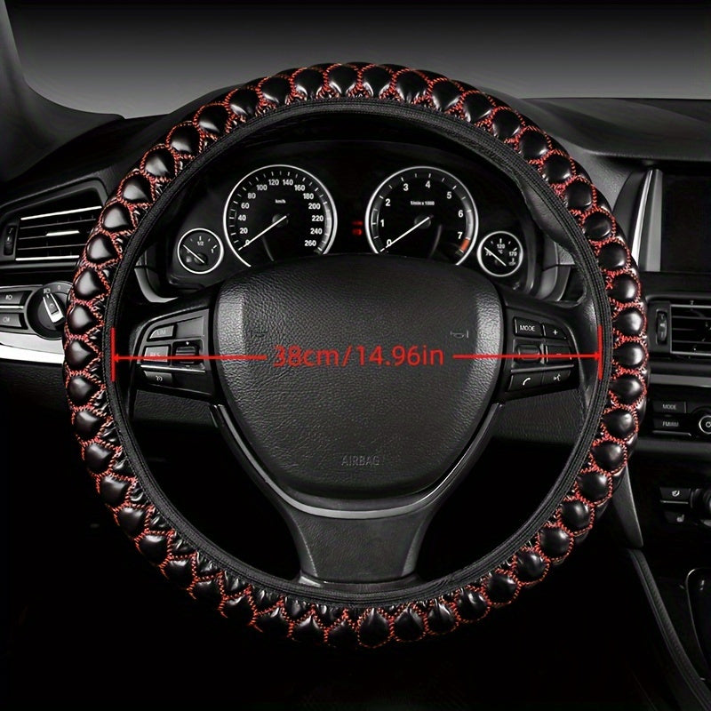 Luxurious embroidered faux leather steering wheel covers with anti-slip grip, universal fit. Comfortable and durable accessory for your vehicle.