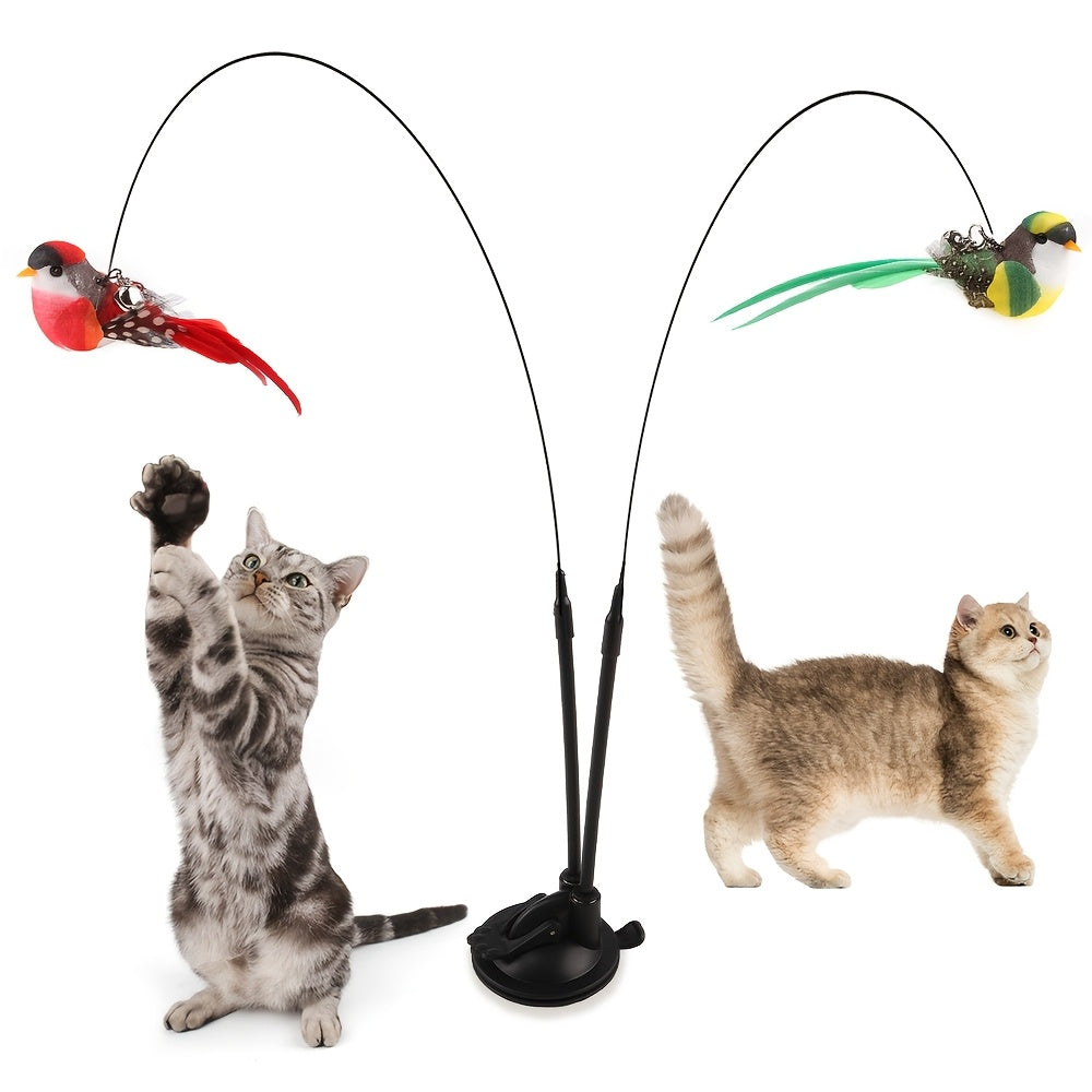 Cat toy set with cartoon pattern, feathers, bell, and adhesive base; no batteries required.