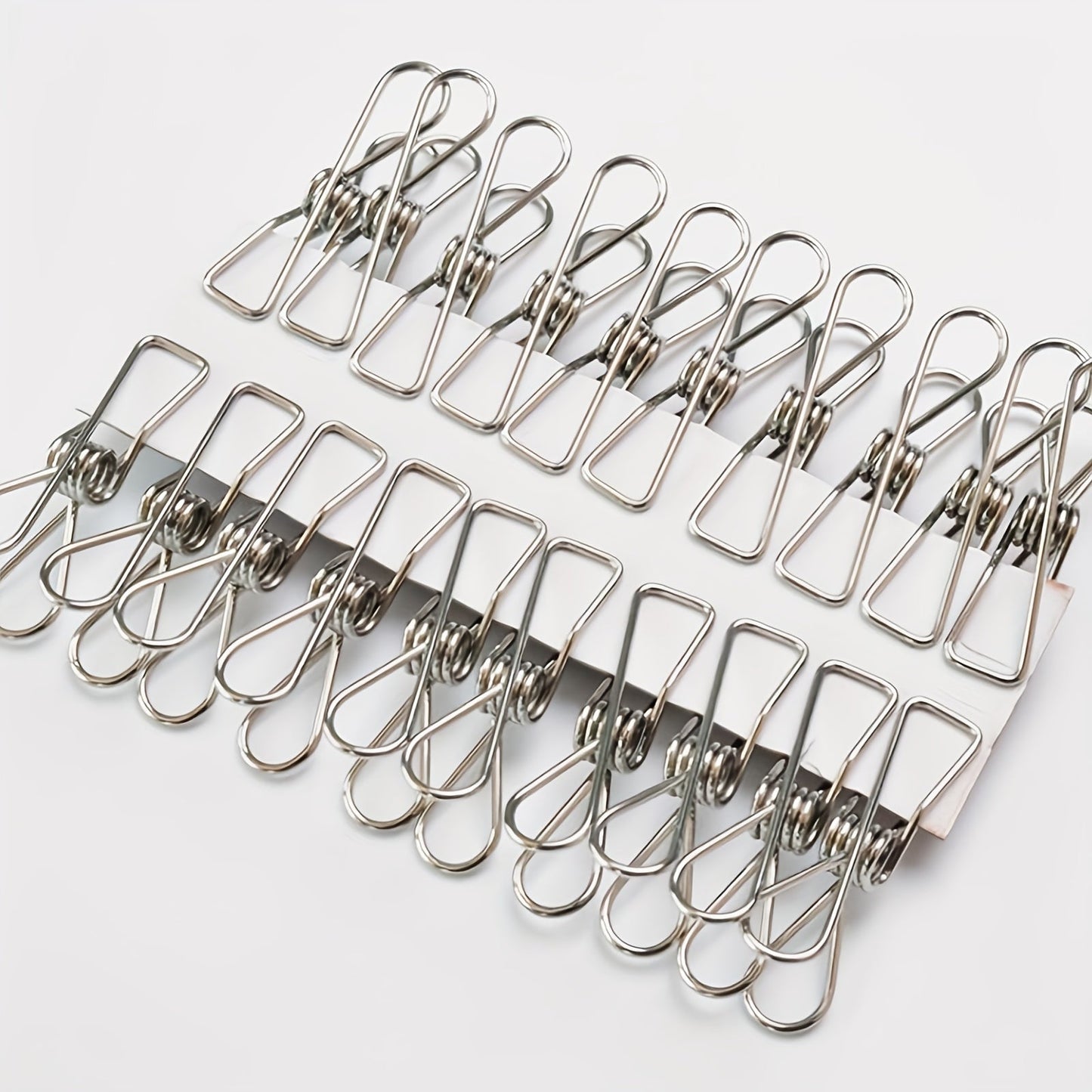 20 pieces of Stainless Steel Clothes Pins, Long-lasting Clothes Pegs, Versatile Metal Wire Utility Clips perfect for Laundry, Home, Kitchen, Outdoor, Travel, and Office use.