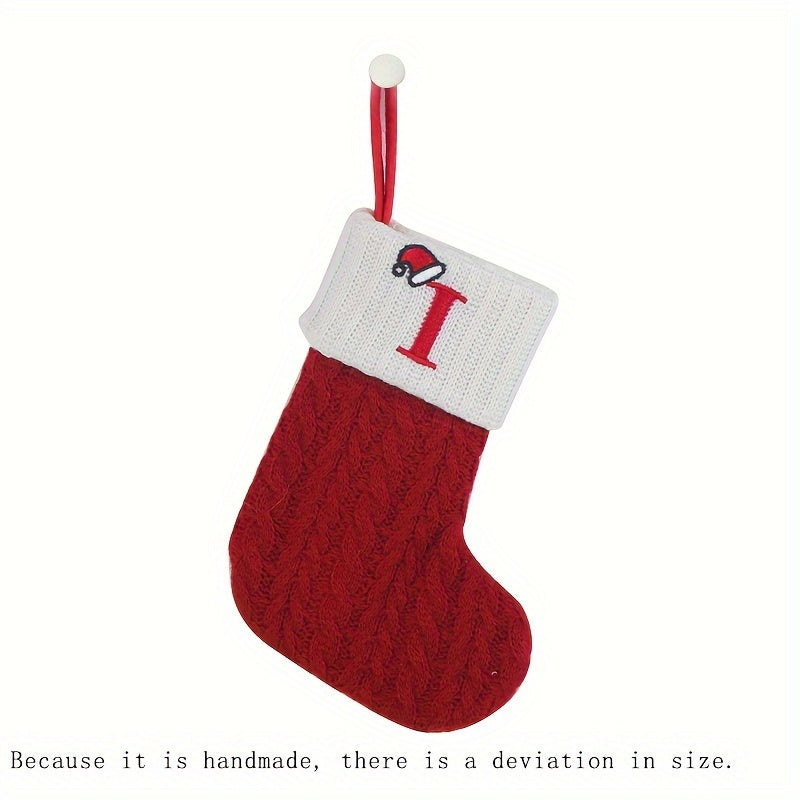 11" Christmas stocking with knitted alphabet design, perfect for hanging on the Xmas tree or using as a gift bag. Made of polyester.