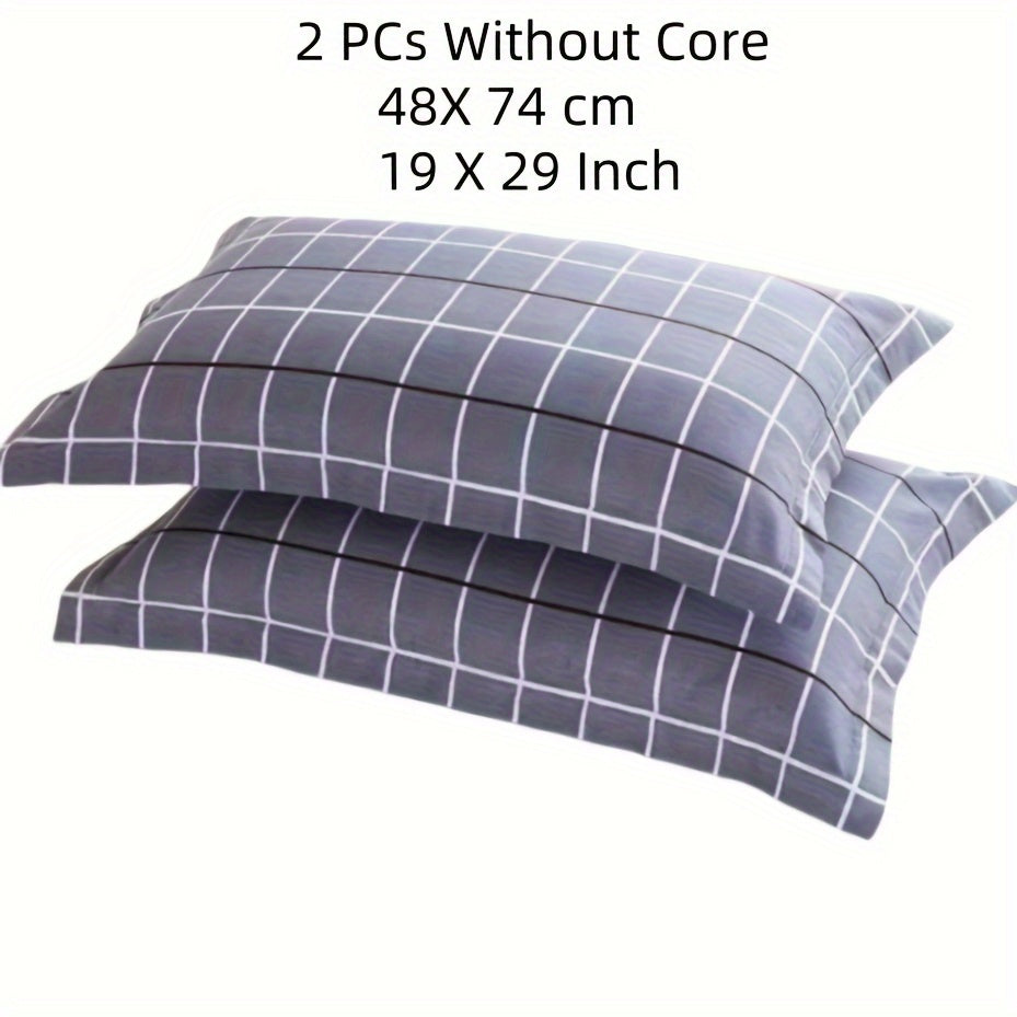 Two soft brushed pillow covers with a geometric plaid design and envelope closure - ideal for adding a touch of style to your bedroom decor or as a thoughtful Thanksgiving gift idea.