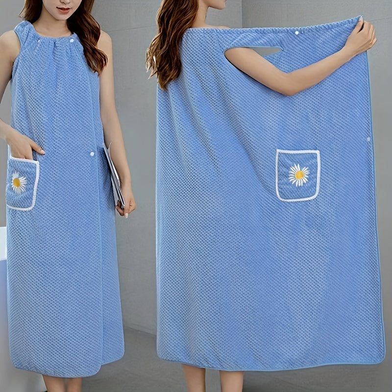 Adults' wearable bath towel features pockets, buttons, and quick-drying, absorbent material. Perfect for home spa or sauna use.