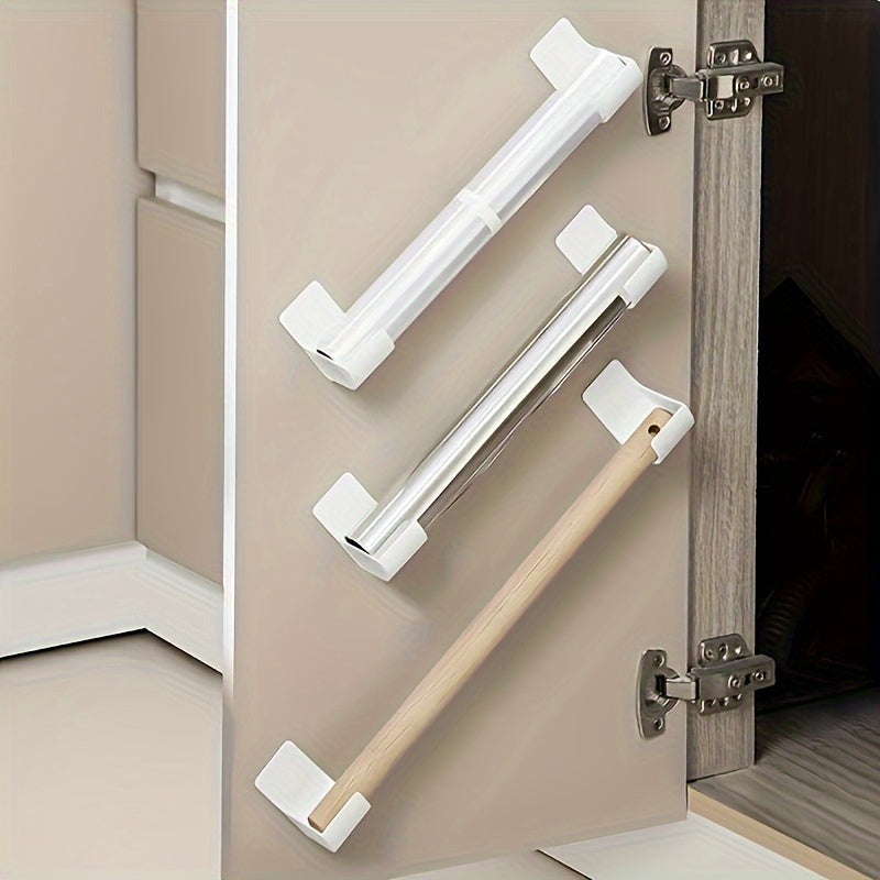 Easy to install without drilling, these 4 kitchen storage racks are perfect for organizing cling film, garbage bags, and more. Made of plastic, they have a sleek white design and adhesive backing for use on cabinets, refrigerator sides, and more. Keep