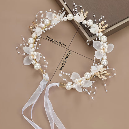 Romantic bridal headpiece with faux pearls, floral wreath, and ribbon tie.