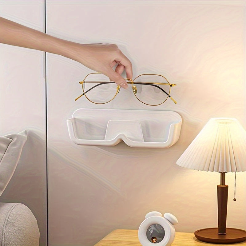 1 piece of Space-Saving Wall-Mounted Eyeglasses Holder, Stylish Display & Storage Tray without the need for drilling, made of plastic. Ideal for organizing women's fashion accessories and eyewear.