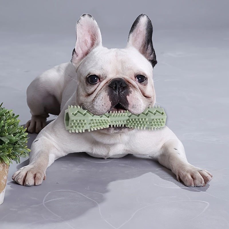 Soft rubber dog toothbrush toy for interactive cleaning and chewing.