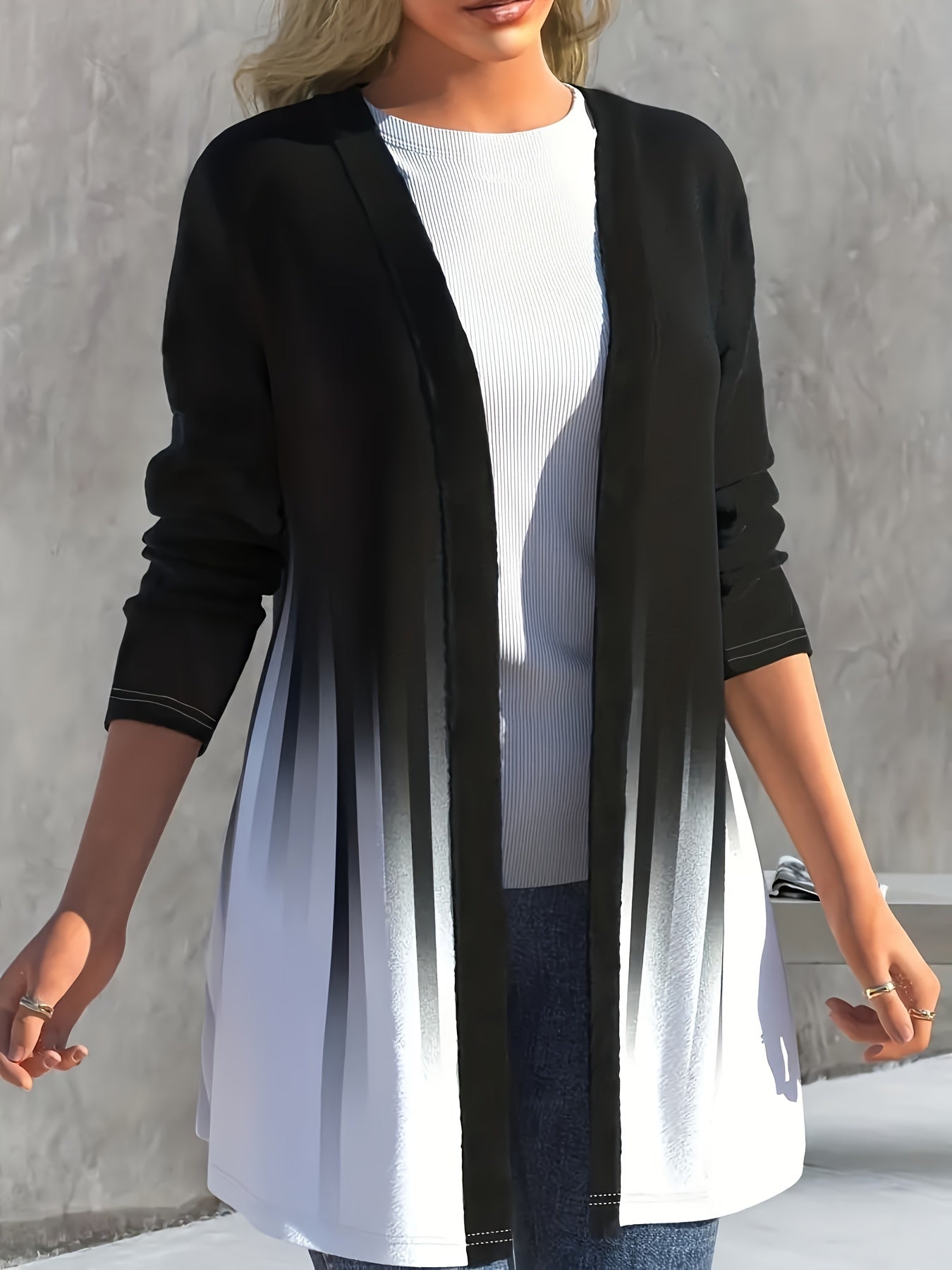 Elegant black to white ombre cardigan for plus size women. Features long sleeves, asymmetric hem, and lightweight polyester blend. Machine washable.