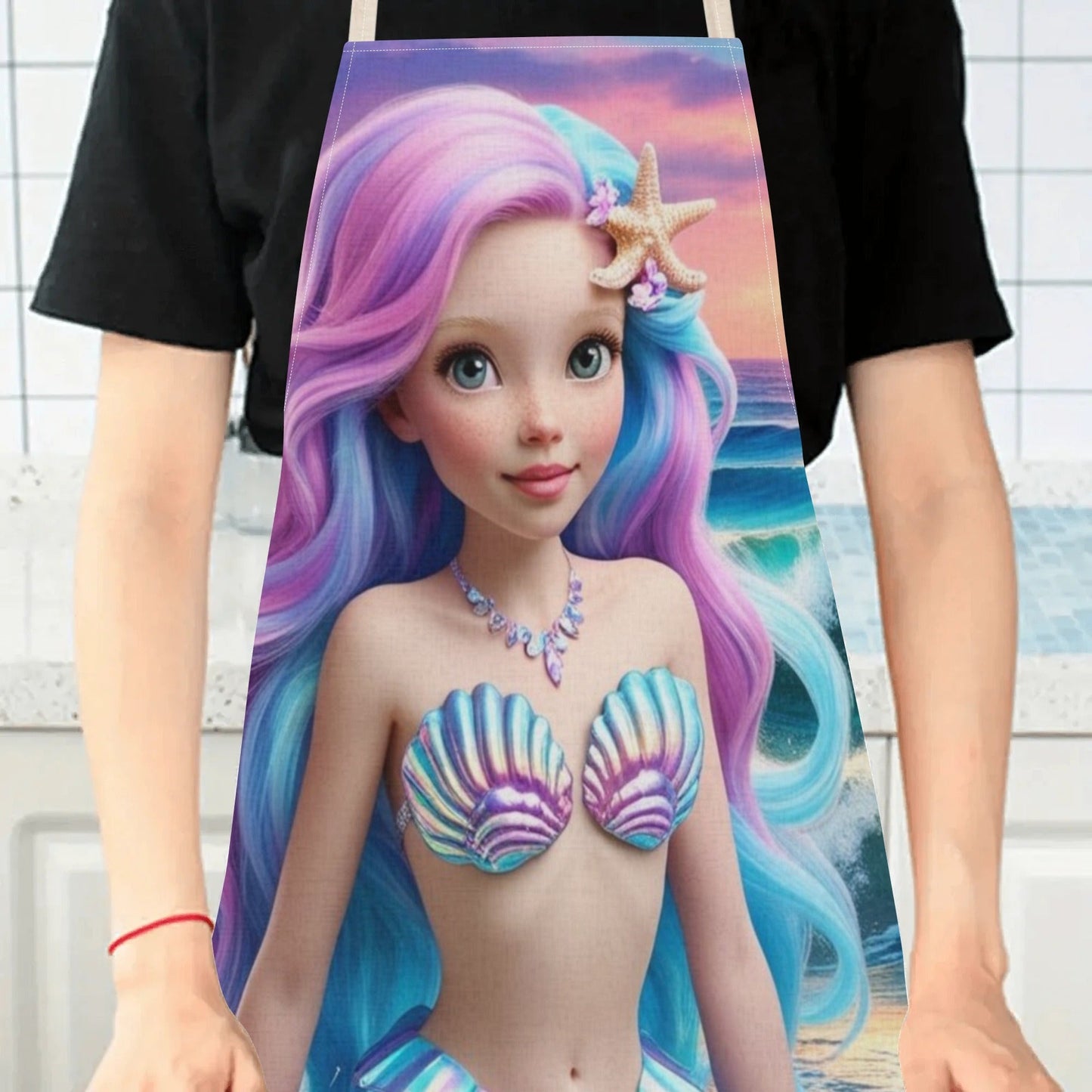 Elevate your kitchen style with the Ariel Princess Waterproof Apron by Disney! Featuring a vibrant and fashion-forward mermaid cartoon pattern design, this apron is perfect for use in hotels, supermarkets, restaurants, fruit shops, and milk tea stands.