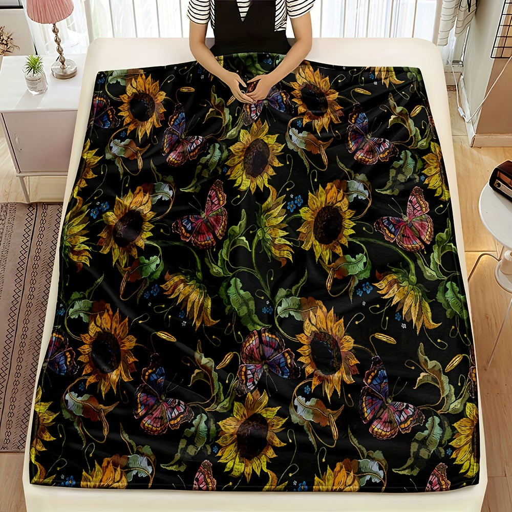 One piece of a Sunflower Throw Blanket made of soft and warm fleece, featuring an all-season floral pattern. This multi-use blanket is a perfect gift for use on the sofa, in the office, on the bed, or while camping. It is crafted from 250-300g superfine