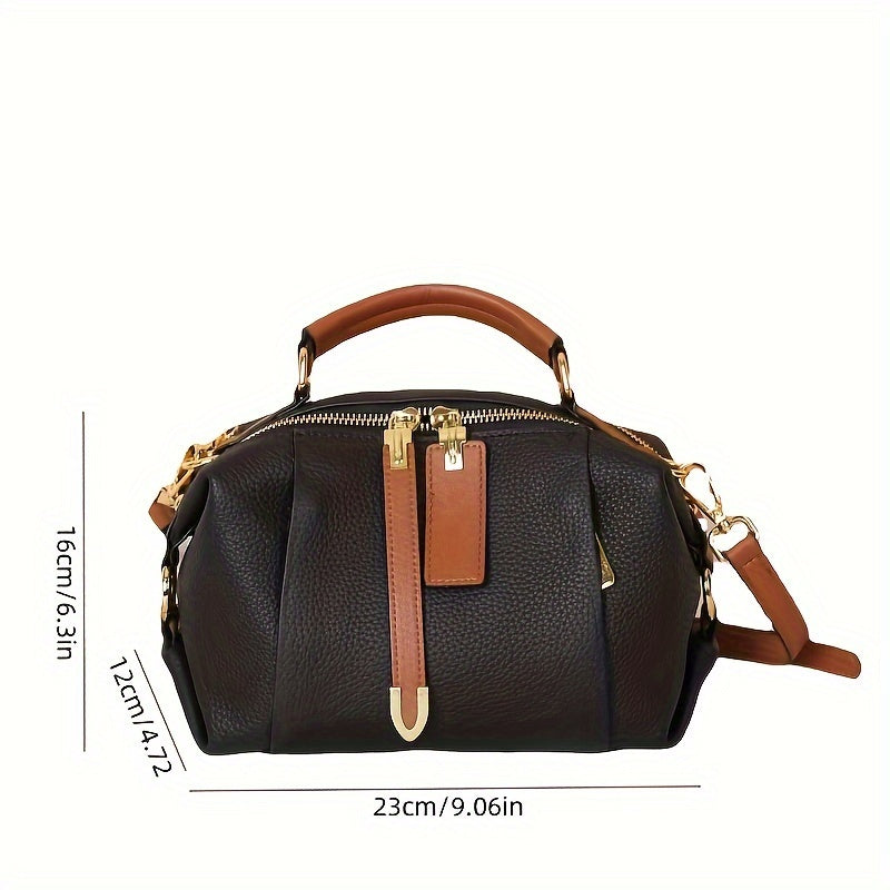 Genuine leather fashion handbag for women with versatile carrying options, large capacity, and stylish design.