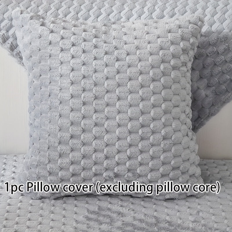 Non-slip sofa cover with honeycomb pattern, ideal for all seasons and protecting furniture in any room.