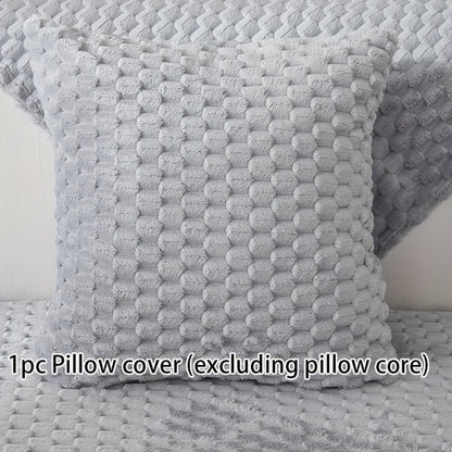 Non-slip sofa cover with honeycomb pattern, ideal for all seasons and protecting furniture in any room.