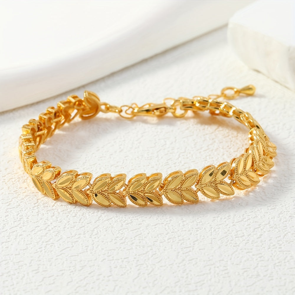 A luxurious tribal design bracelet plated in 24K gold, featuring a unique copper wheat sheaf design. This adjustable open cuff is perfect for women and makes an ideal gift for any occasion, including weddings and Valentine's Day. Versatile enough for all