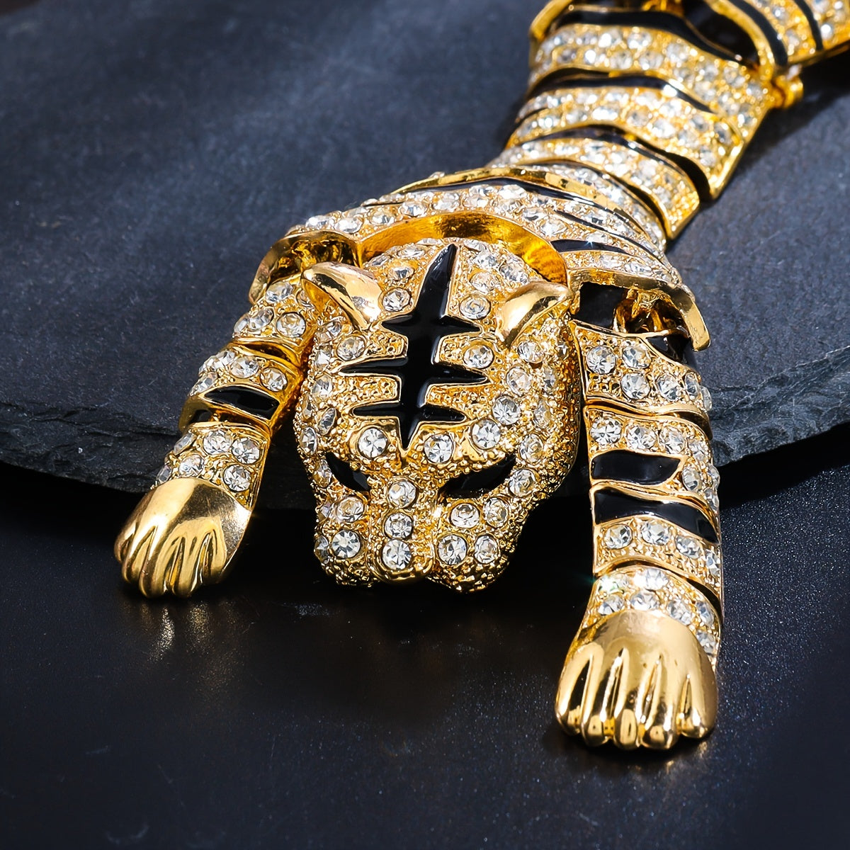 A premium rhinestone-studded tiger shoulder brooch.