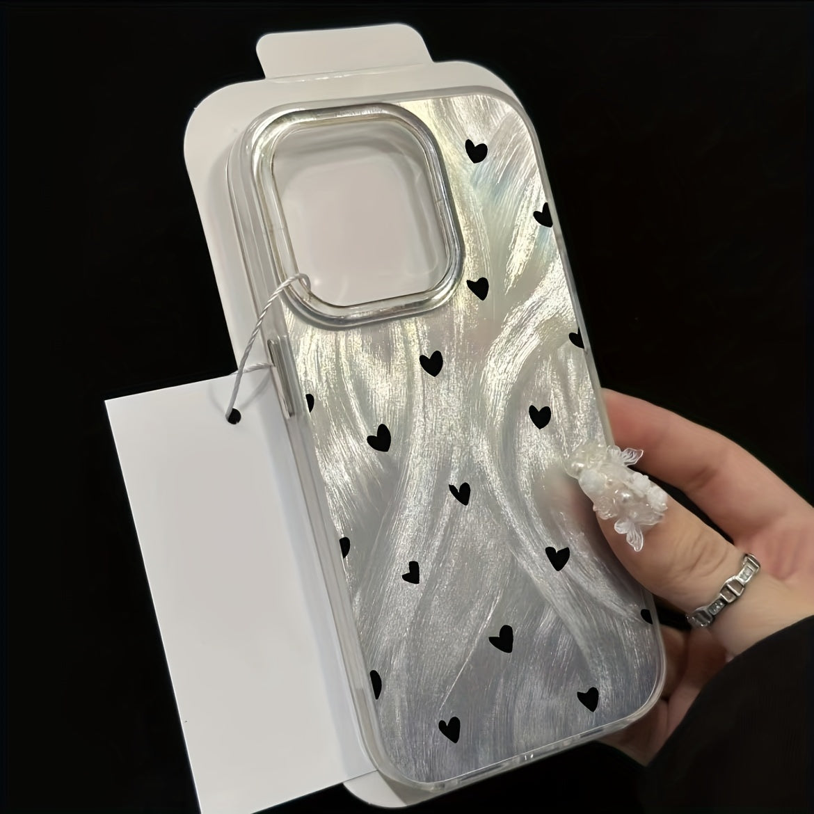 Stylish and elegant feather heart phone case, ideal for gifting, compatible with various iPhone models.