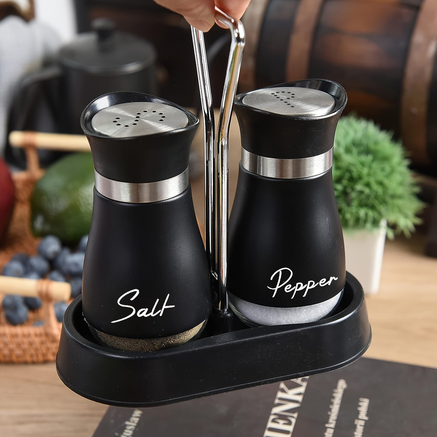 Salt and pepper shakers set with stainless steel bracket and electroplated handle, perfect for table, RV, camp, or BBQ.