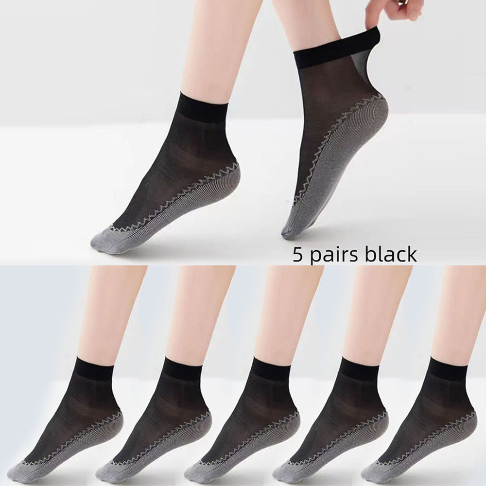 5 pairs of semi-sheer socks with non-slip bottoms for women.