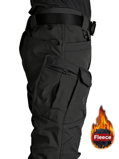 Men's outdoor work pants with pocket design, soft shell fleece lining, mid-rise style, suitable for autumn and winter seasons.