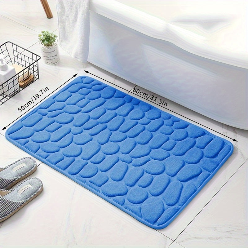 Soft, non-slip coral fleece bathroom mat in a pebble pattern. Quick-dry, machine washable, and low pile for comfort and home decor. Made of plush polyester fiber with knit fabric and 100% polyester material. 570gsm and 1.4cm thick.