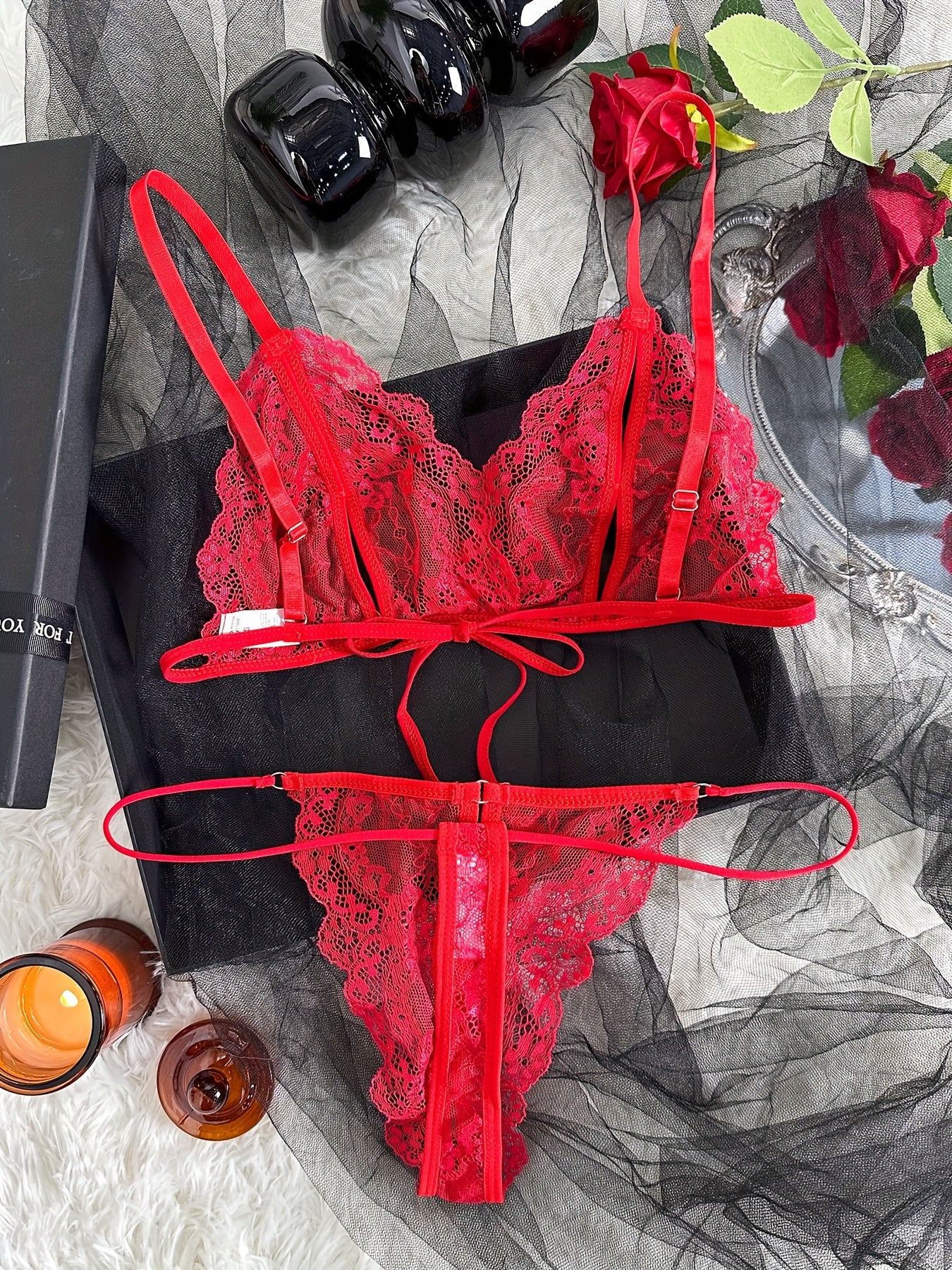 Women's sexy floral lace lingerie set with cut-out strappy bra and thong