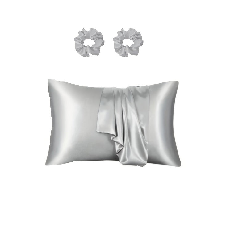 Luxurious satin pillowcase and hair scrunchies with minimalist design. Ideal for home, hotel, or bedroom use. Includes matching set of 2 scrunchies.