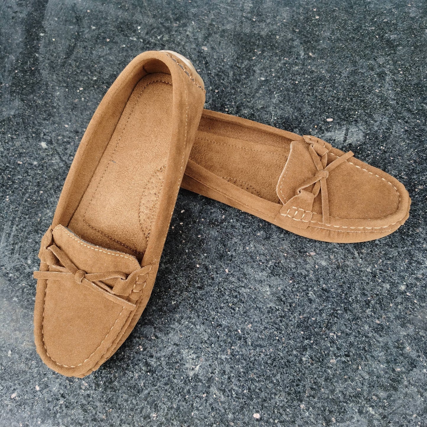 Retro flat loafers with bow detail, slip on style, and soft sole for casual wear.