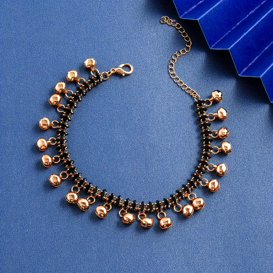 Stylish Copper Anklet adorned with Black Glass Marquise and Bell Charms, perfect for Women, exuding a Vintage Vibe, ideal for Daily Wear or Vacation.