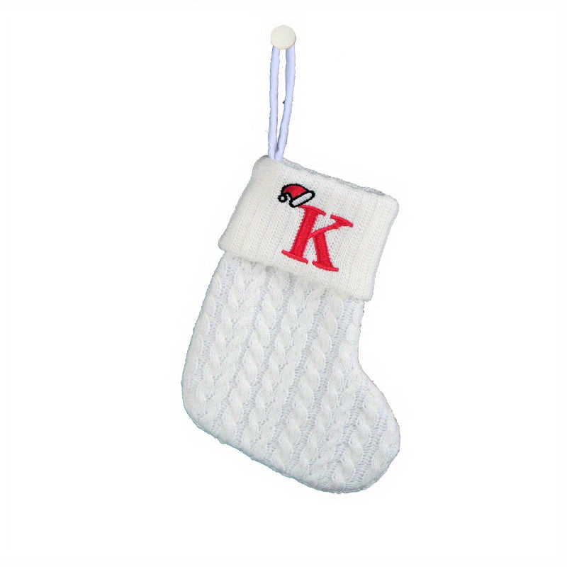 White cable knit stocking with embroidered 'F' - Ideal for indoor decor.