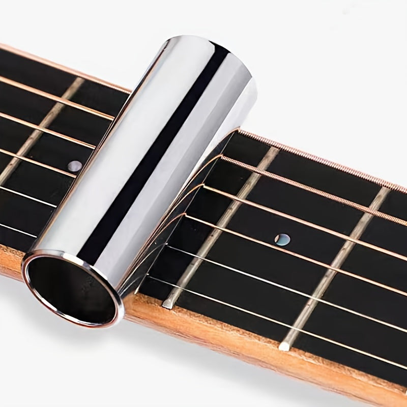 1 Guitar slide stick and finger ring made of glass or stainless steel, with finger sleeve made of clear glass or bakelite.