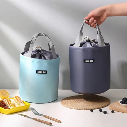 The versatile 1pc Twill Cylinder Bento Bag is perfect for outdoor picnics, with an included ice pack to keep your food fresh. This waterproof bag also doubles as a lunch box, making it ideal for back to school or college. Hand washable and insulated