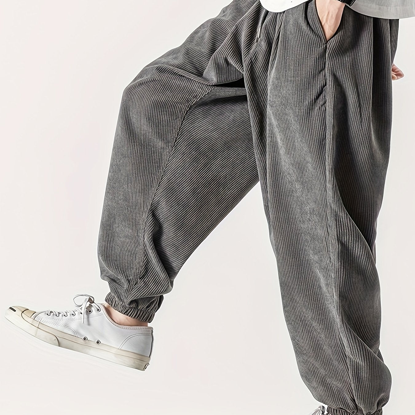 Men's wide leg corduroy pants with drawstring, chic and comfy for spring and fall.