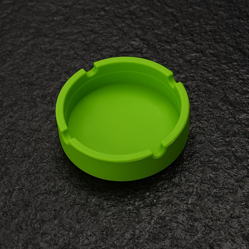 Round silicone ashtray for home or office use, suitable as a gift.