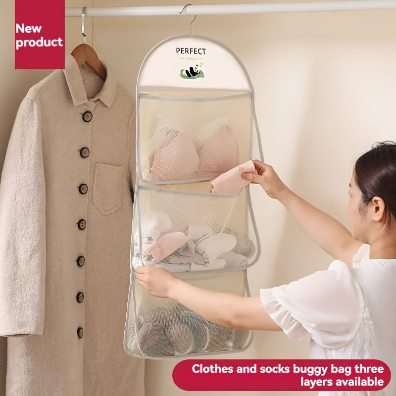 Space-saving wardrobe organizer with 3.2+ cubic feet capacity made of multi-layer mesh for socks, underwear, and more.