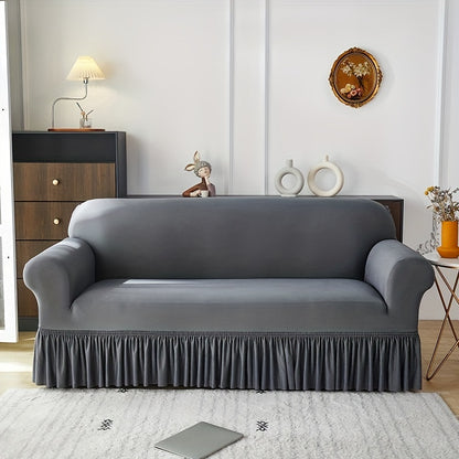 Elastic sofa cover with skirt, universal for all seasons, suitable for living room, office, and home decor.