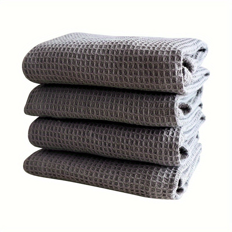 4 pieces of thickened waffle weave dish towels for household kitchen cleaning, absorbent and in mixed colors.