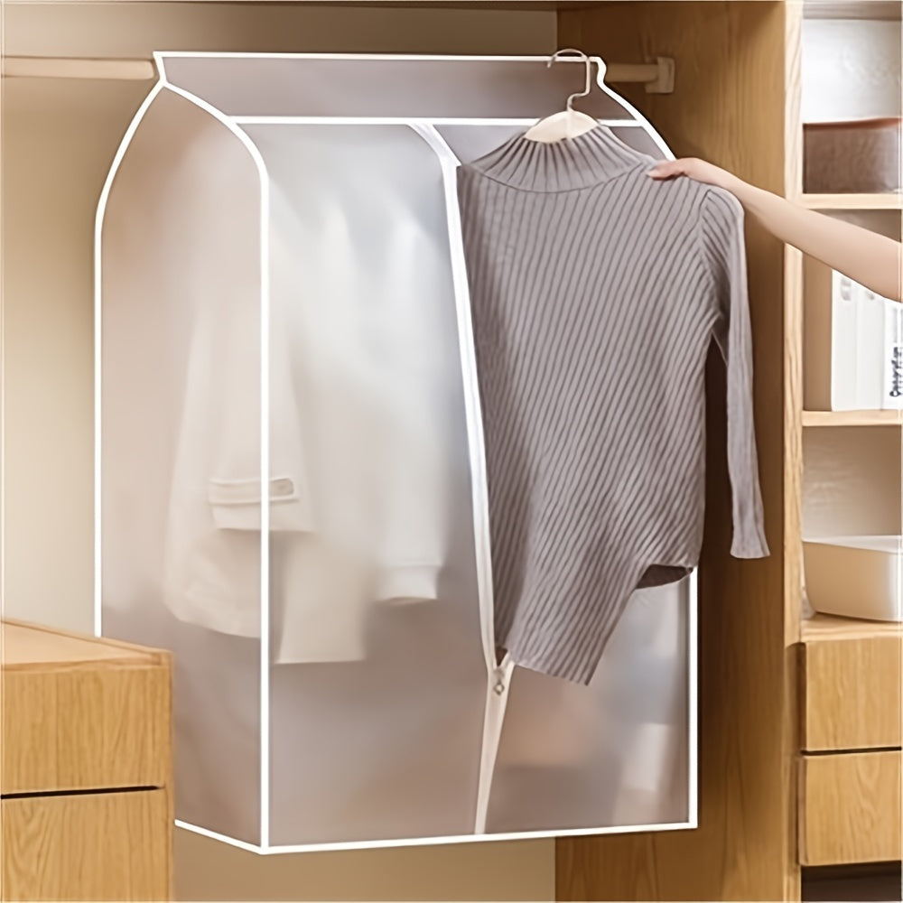 Protect your clothes with this lightweight, translucent garment cover. It is dustproof and waterproof, featuring a full zipper, magic tape, and strap for coats, dresses, and windbreakers. Dimensions are 59.99x50.01x119.99 cm.