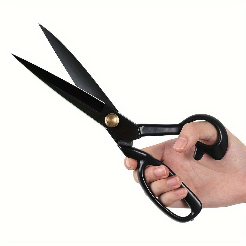 Tailor's Scissors made of high carbon steel with razor blade for fabric cutting. Features right-handed design with ergonomic black handles, ideal for precision cutting in crafting, sewing