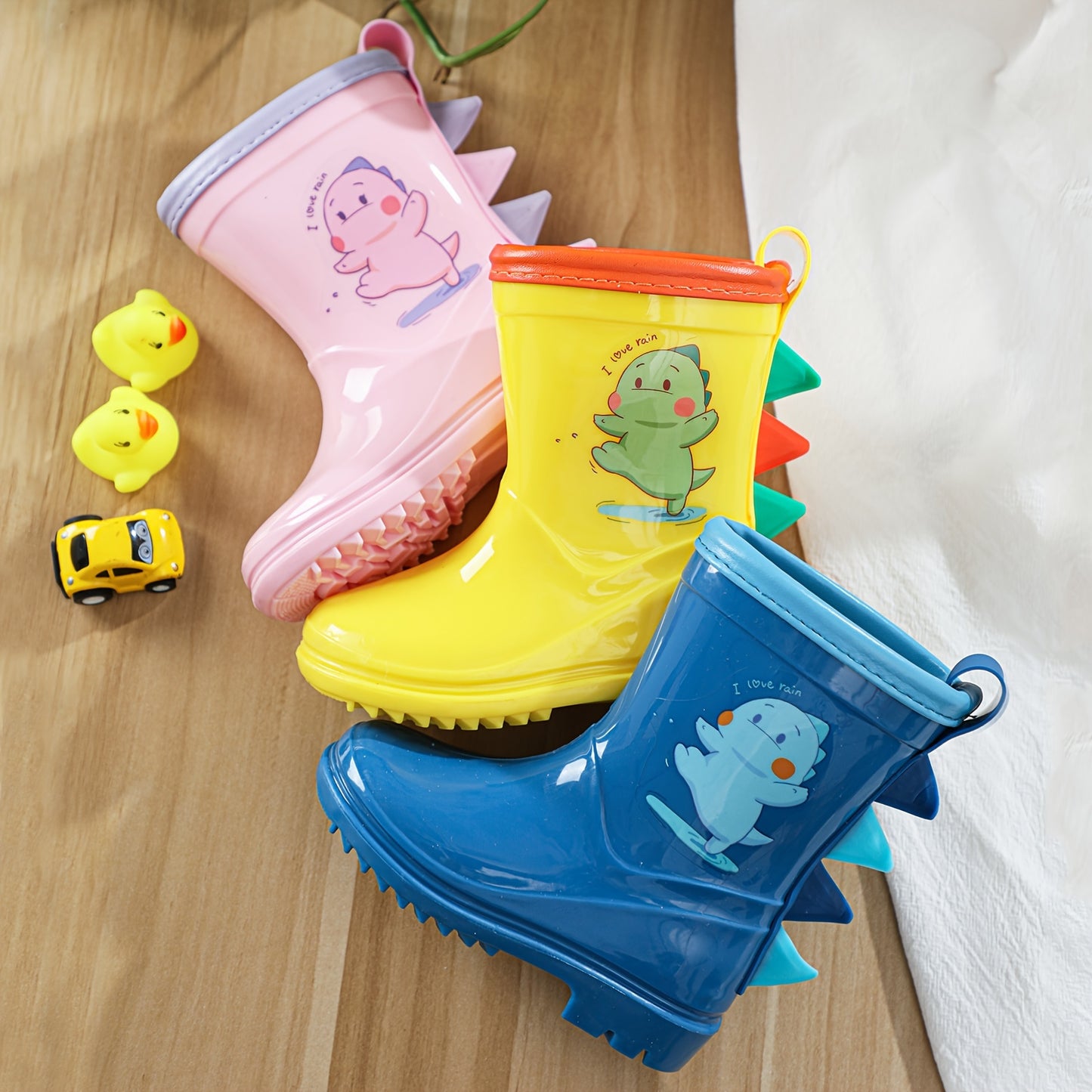 GentleChild Cute Dinosaur Kids' Rain Boots - Waterproof, Non-Slip for Ages 1-8, Ideal for outdoor play and beach adventures.