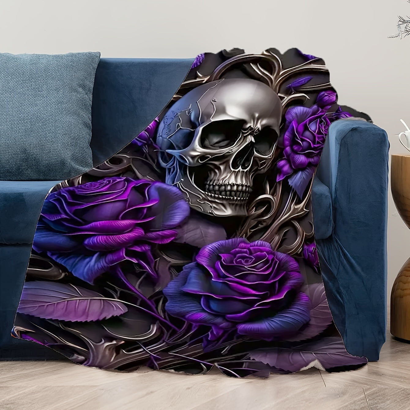 Soft, hypoallergenic flannel throw blanket featuring a traditional skull and roses print. This multipurpose blanket is perfect for all seasons and can be hand washed for easy maintenance. Made with soft polyester, it is ideal for boys, girls, and adults