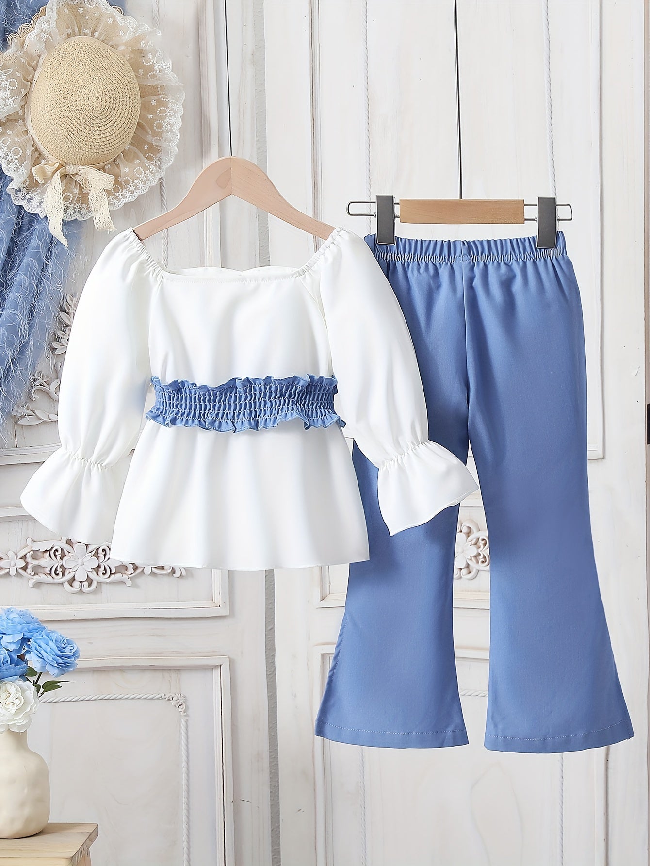 Girls' long pants suit including a waist-cinched long-sleeved top and fashionable bell-bottom pants, suitable for outdoor wear in spring and autumn.