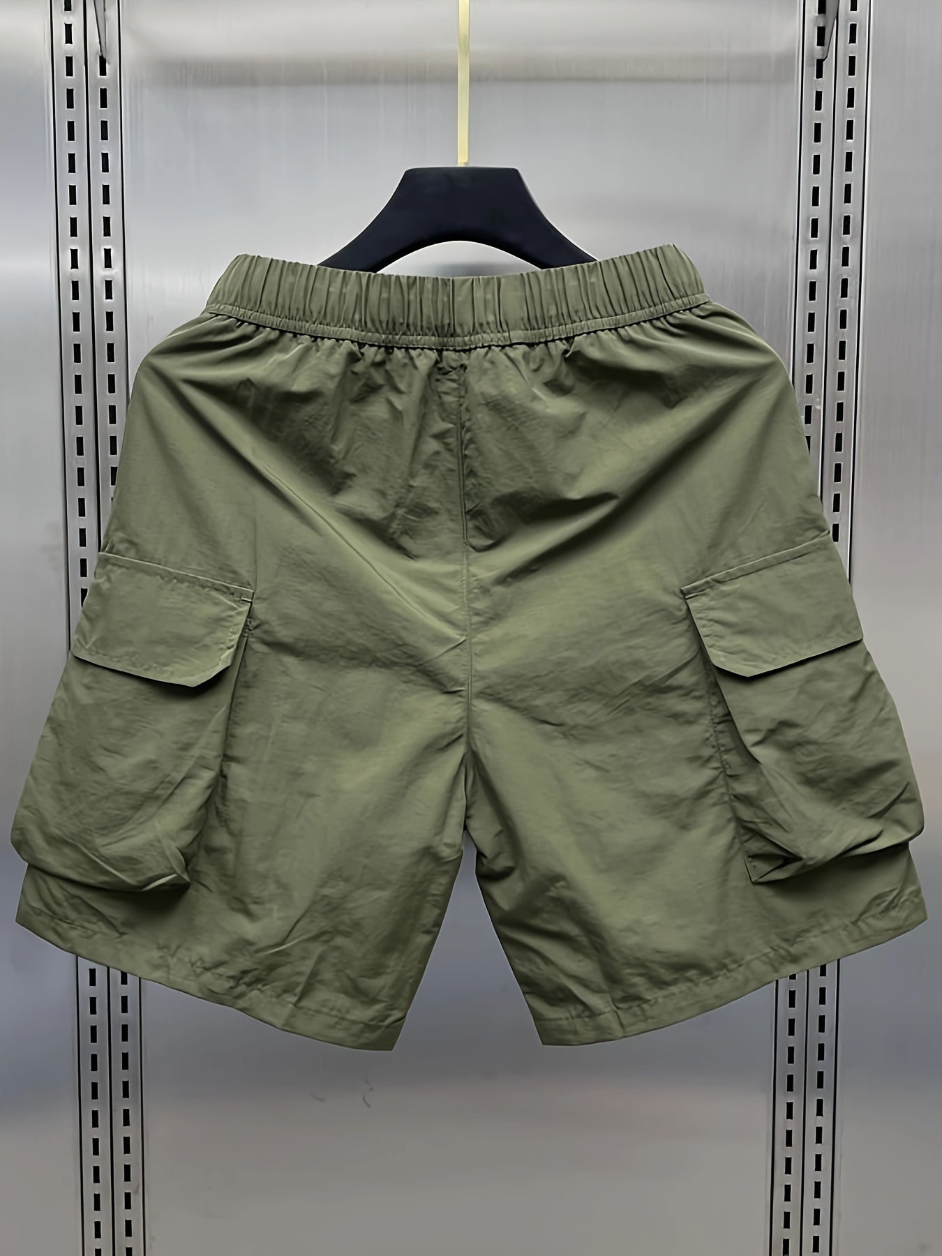 Japanese retro cargo shorts for men, loose fit, mid waist, with multiple pockets. Made of 100% polyamide, non-stretch, lightweight at 160g/m², ideal for hiking and outdoor activities.