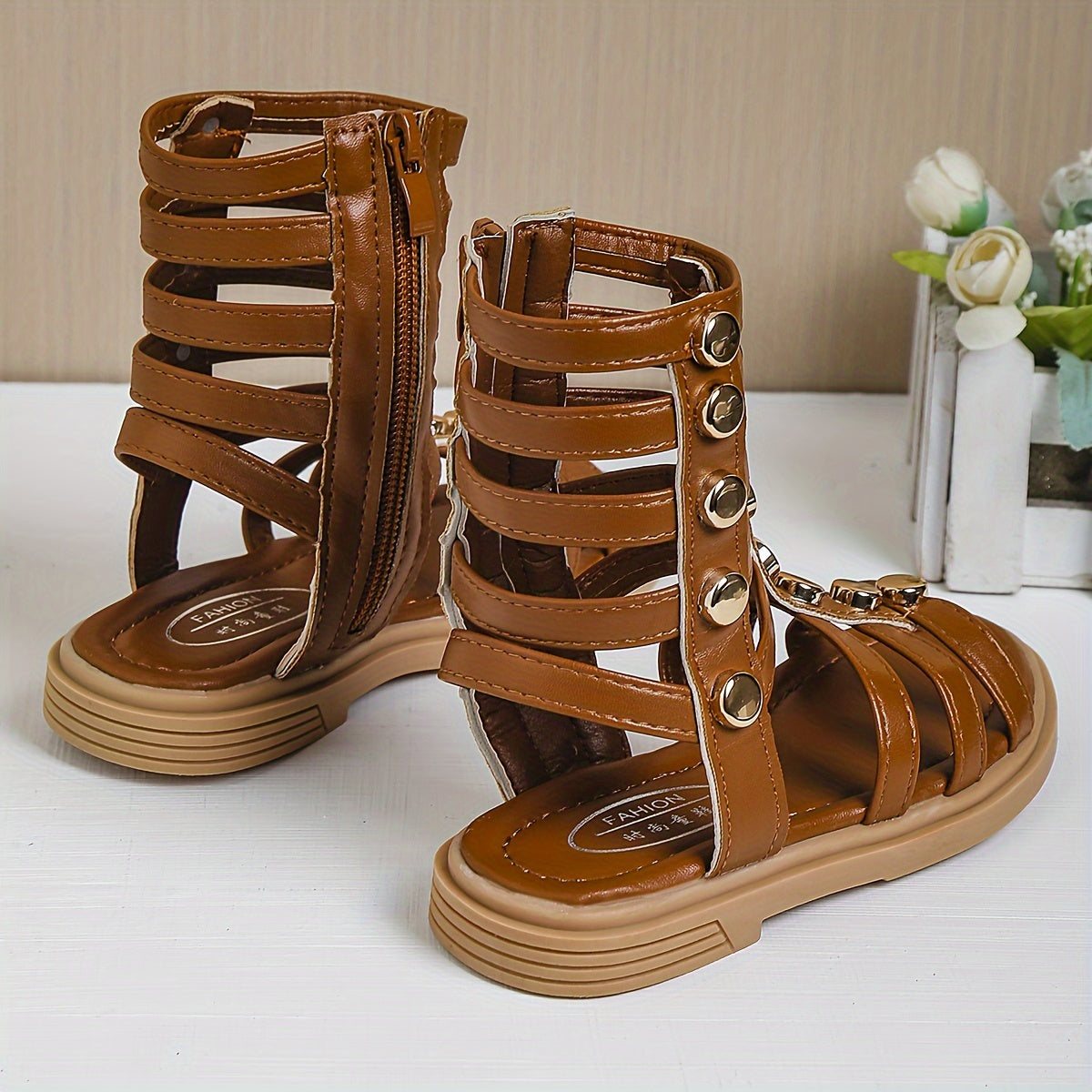 1 Pair of Fashion Rivet Buckle Sandals with Geometric Pattern, Back Zipper, Synthetic Faux Leather Upper and Rubber Sole for Spring/Summer Wear.