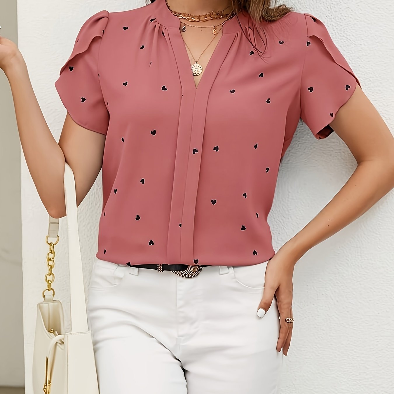 Light blue heart pattern V-neck blouse for women in casual polyester/spandex, available in petite sizes, machine washable, everyday fashion with smooth texture.