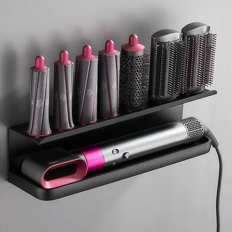 Wall-mounted metal organizer for hair dryer and curler, saving space in the bathroom.