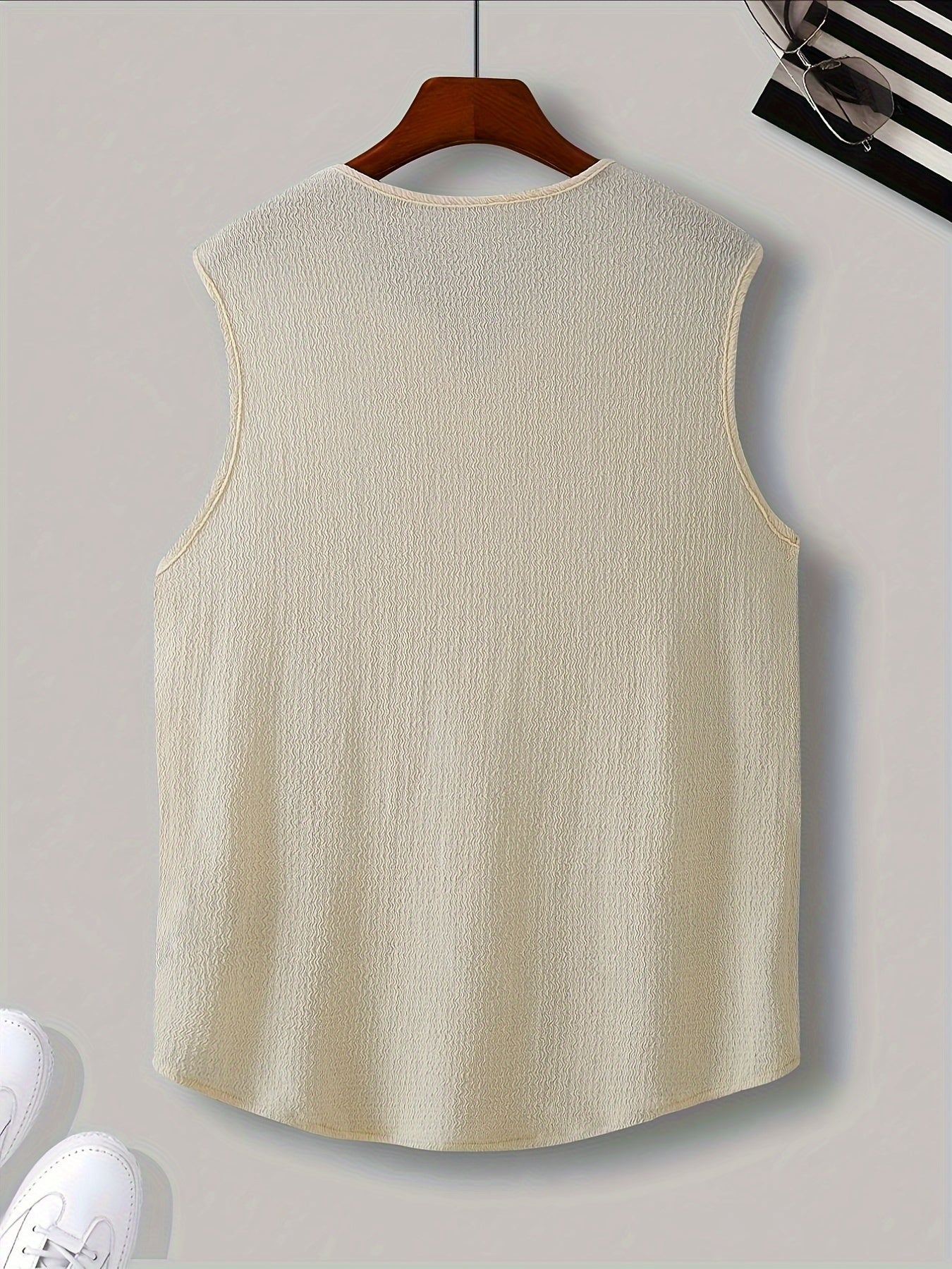 Polyester tank top for men with loose fit and slight stretch, perfect for casual summer outings.