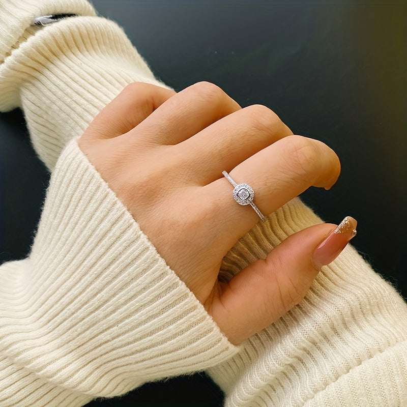 925 Sterling Silver Ring with 1.5g weight features a unique double layer square design, simple band paved with sparkling micro zirconia. Ideal birthday gift option. (No box included)