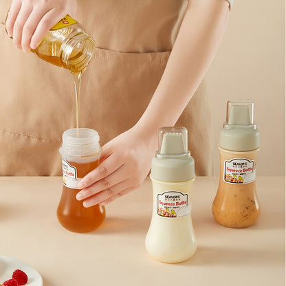 Plastic squeeze bottle for sauces - hand wash only, PVC free, food-grade kitchen dispenser for condiments like salad dressing, ketchup, honey, and jam. Ideal for home use.