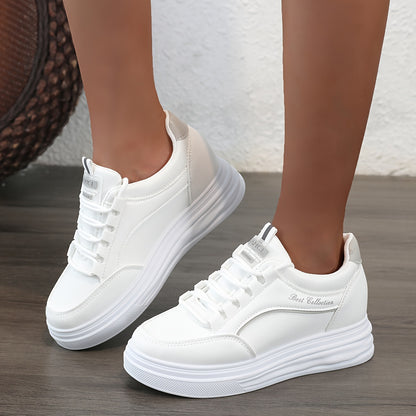 White lace-up sneakers with thick soles, perfect for casual wear.