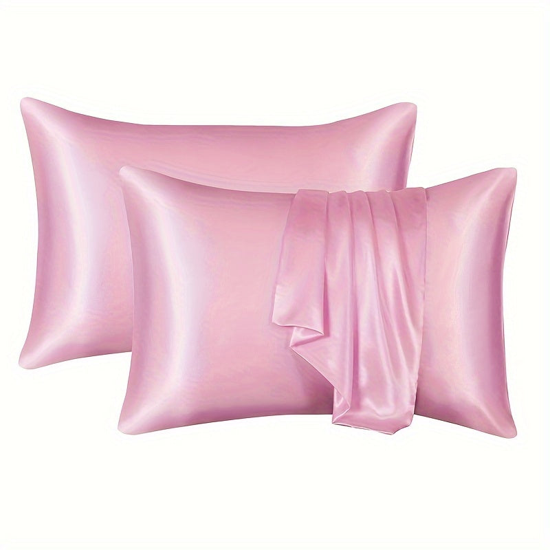 A set of two luxurious sateen pillowcases, each weighing 90g and featuring an envelope closure. Crafted from 100% polyester satin and silky fabric, these pillowcases are designed to be gentle on both hair and skin. They come in a variety of colors to